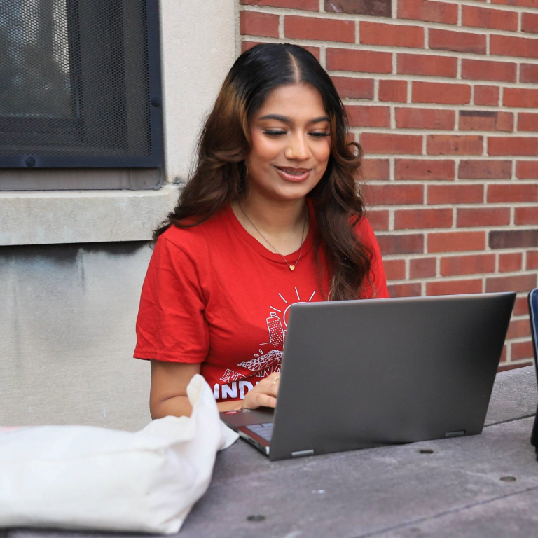 A student on a computer.
