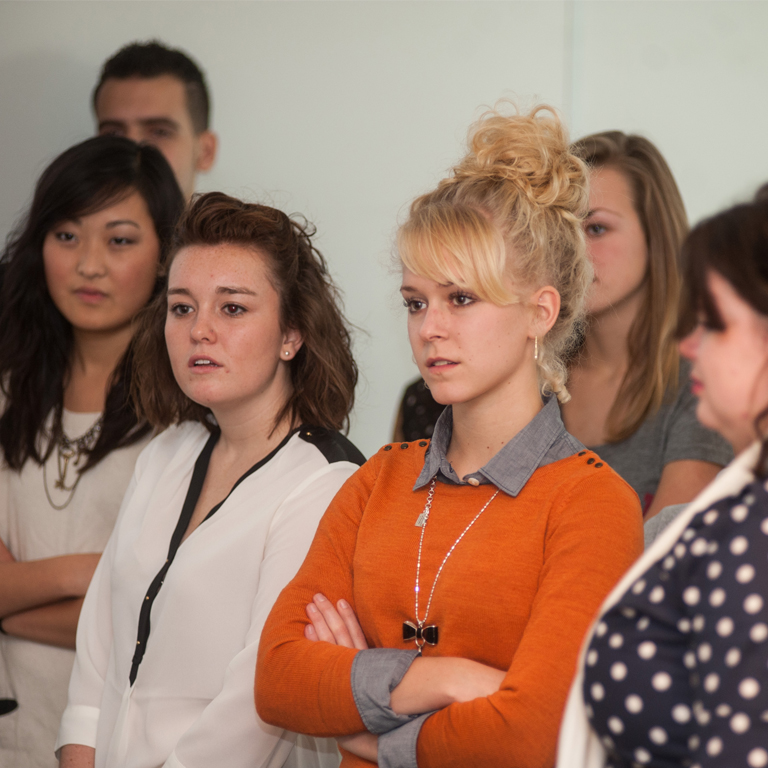 Student organization members at what appears to be a serious meeting.
