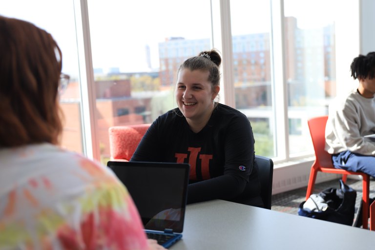 Students in North Hall talking and having a good time.