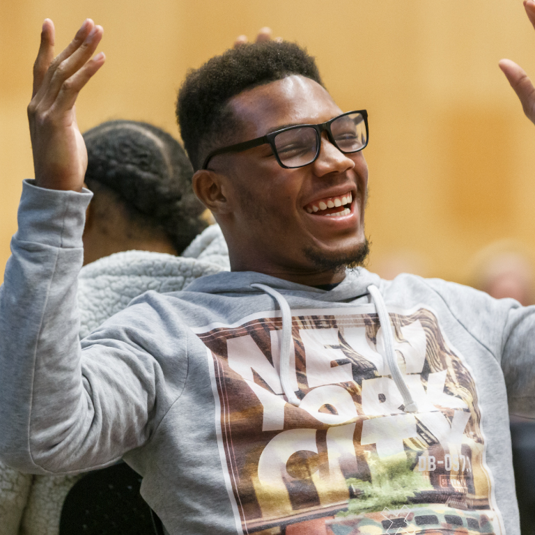 Students and parents participating in family weekend.