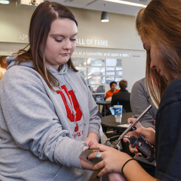 Students and parents participating in family weekend.